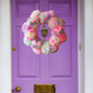 XL tinsel Christmas wreath on front doors